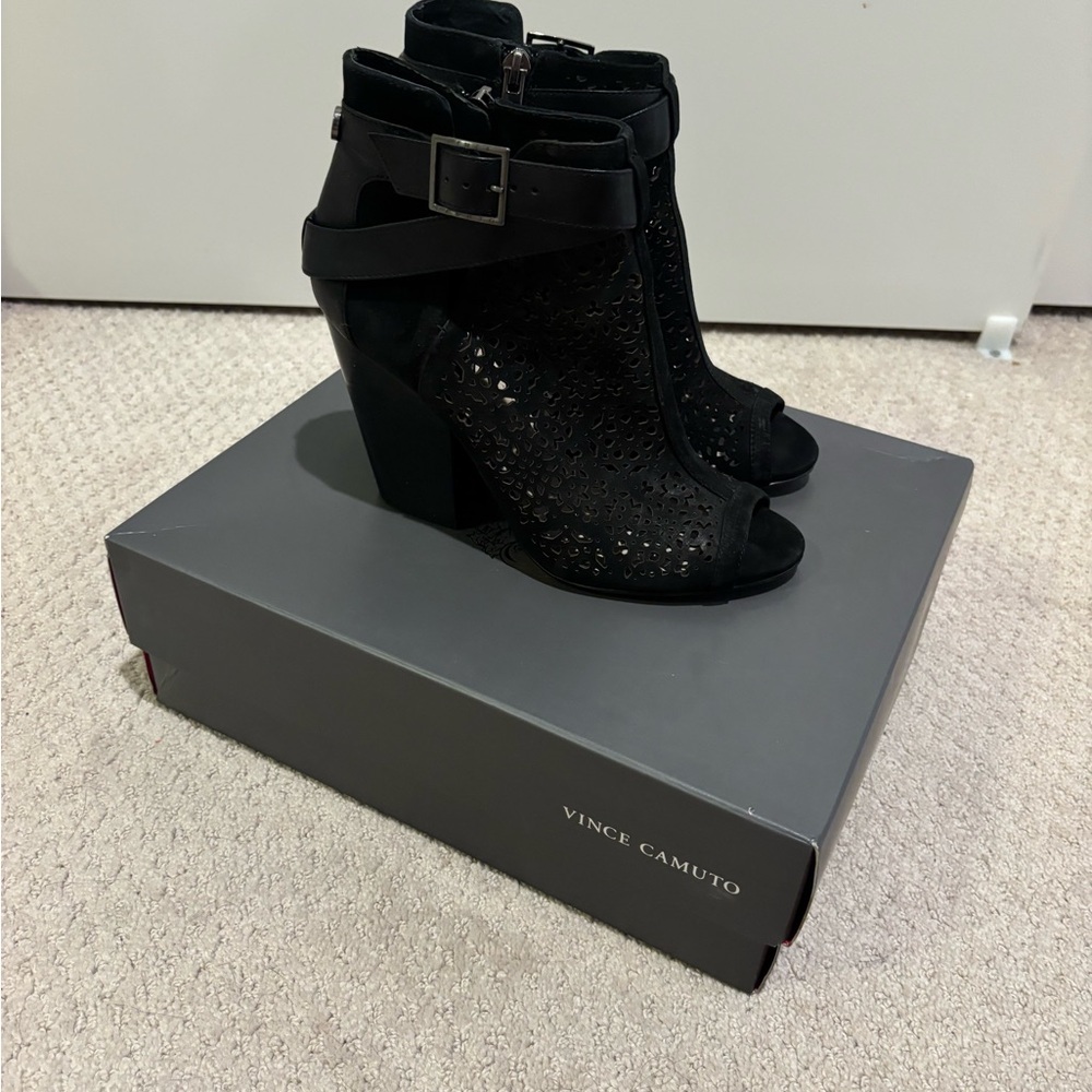 Black peep toe booties by Vince Camuto